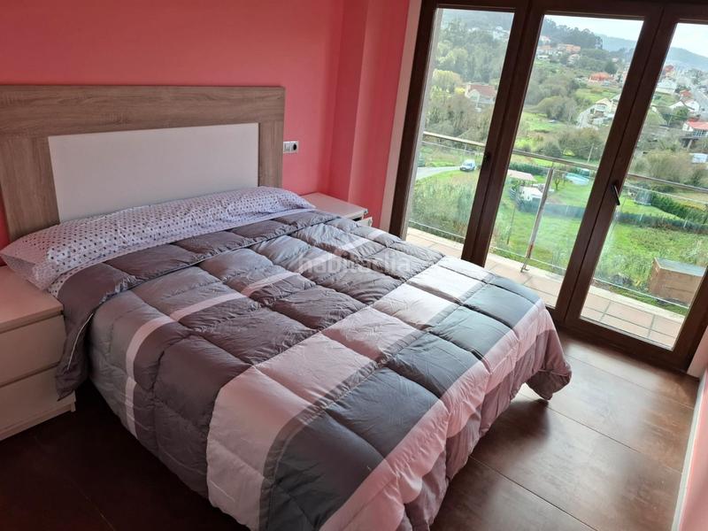 Foto 0eac0751-ea83-45f6-8589-0acd53bd4a78. Piso  muy luminos en seixo, . la vivienda se distribuye en dos habitaciones con armarios empotrados lacados en blanco, salónco en Marín
