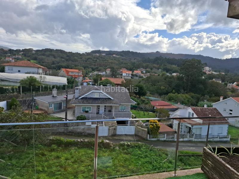 Foto d2d25ca5-d9d1-4f0e-840e-ea8c588eddd0. Piso  muy luminos en seixo, . la vivienda se distribuye en dos habitaciones con armarios empotrados lacados en blanco, salónco en Marín