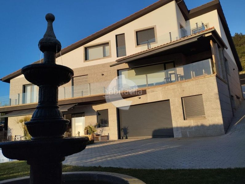 Foto a5b32fec-82e6-4f6d-9f5e-255059ff214b. Casa amb aparcament piscina a Coruxo - Oia - Saiáns Vigo