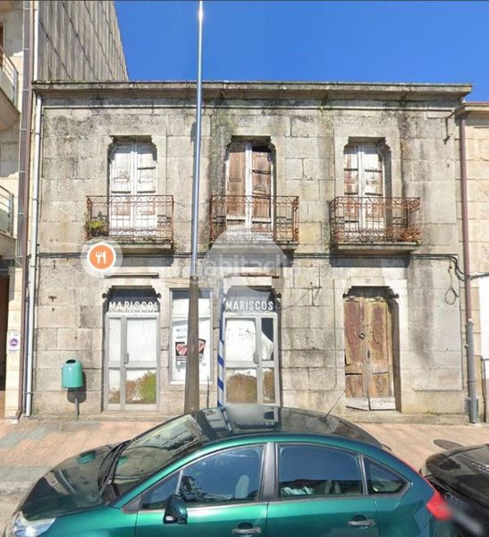 Foto 444a81a6-2667-4207-95cf-38b91c3a5181. Casa adosada oportunidad de compra de casa de piedra con multitud de opciones , ya que se puede rehabilitar y dejar como vivienda en dos en Tui