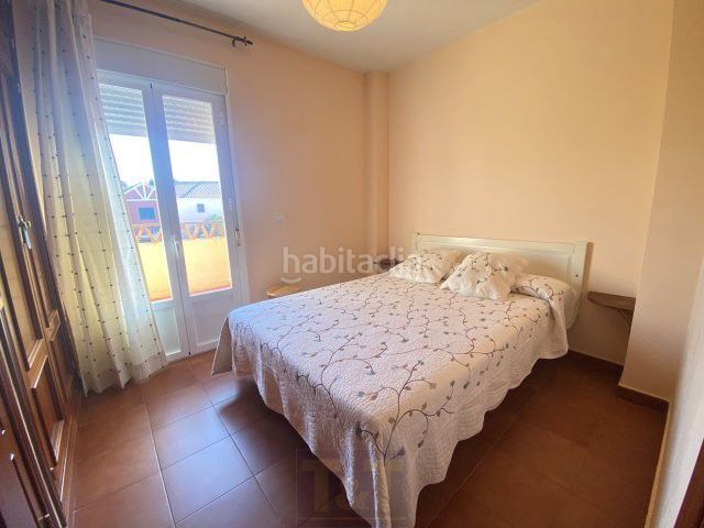 Foto 3416dbdd-64f8-41b3-a62a-298c7b18cd23. Casa adossada amb aparcament a Islantilla golf Islantilla