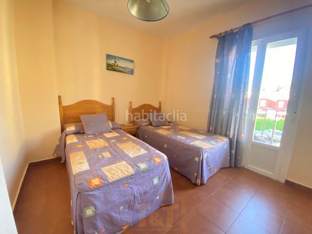 Foto d013e46d-e39e-4f18-b90d-ad5e34cc5aa1. Casa adossada amb aparcament a Islantilla golf Islantilla