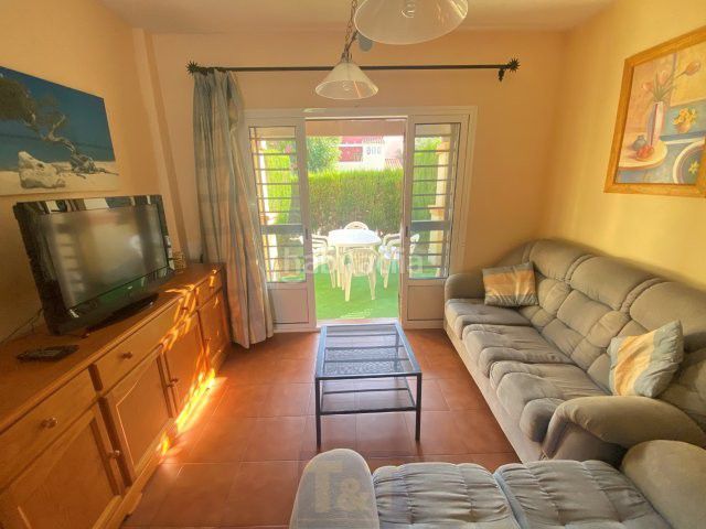 Foto d105a9a7-f79d-48e6-a5e3-4994acf5de6b. Casa adossada amb aparcament a Islantilla golf Islantilla