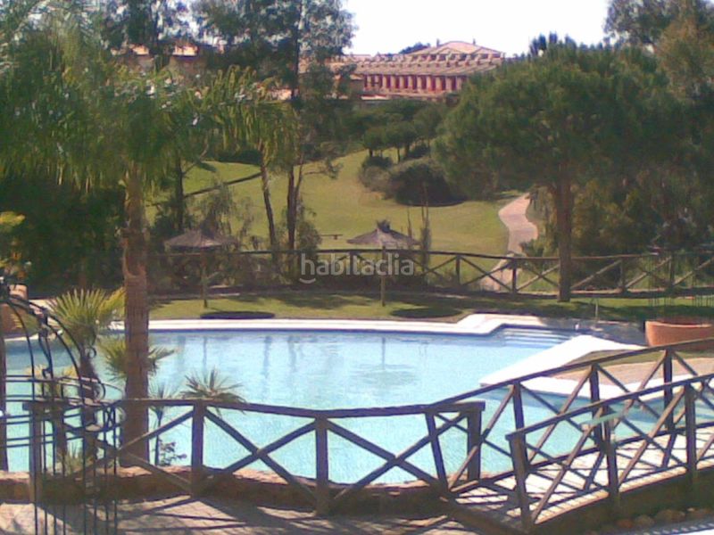 Foto 1cdc0f45-381a-4893-aabe-ddc903b1fee6. Casa adossada amb calefacció aparcament a Islantilla golf Islantilla