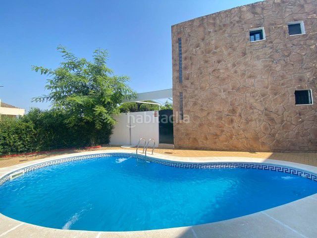 Foto 2827df98-2882-412c-b0a6-75142debfd04. Casa amb aparcament a Islantilla golf Islantilla
