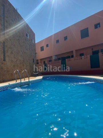 Foto f6a47fa7-9170-4c05-a174-6cfc82eb01f5. Casa amb aparcament a Islantilla golf Islantilla