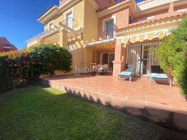 Foto 749dc5f4-8d6e-4e72-8995-6c4fd80a7257. Casa amb aparcament a Islantilla golf Islantilla