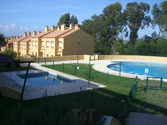 Foto a409f5ca-721d-425e-813d-f909f854f7d5. Casa amb calefacció aparcament a Islantilla golf Islantilla