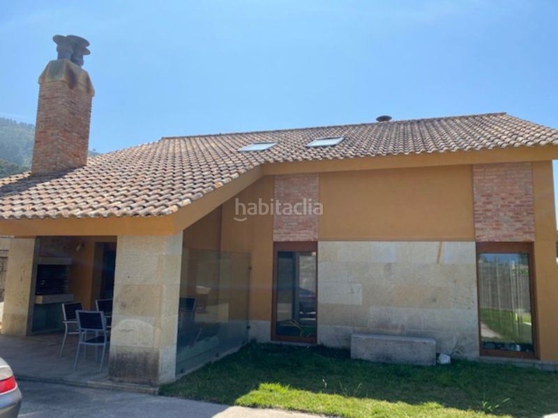 Foto 7511e7ad-9aba-49ac-b1ce-4821f57efb01. Alquiler casa alquiler vacacional disponible del 15 julio al 15 de agosto. preciosa vivienda unifamiliar en finca de 1000 m2 con arboles, piscin en Oia