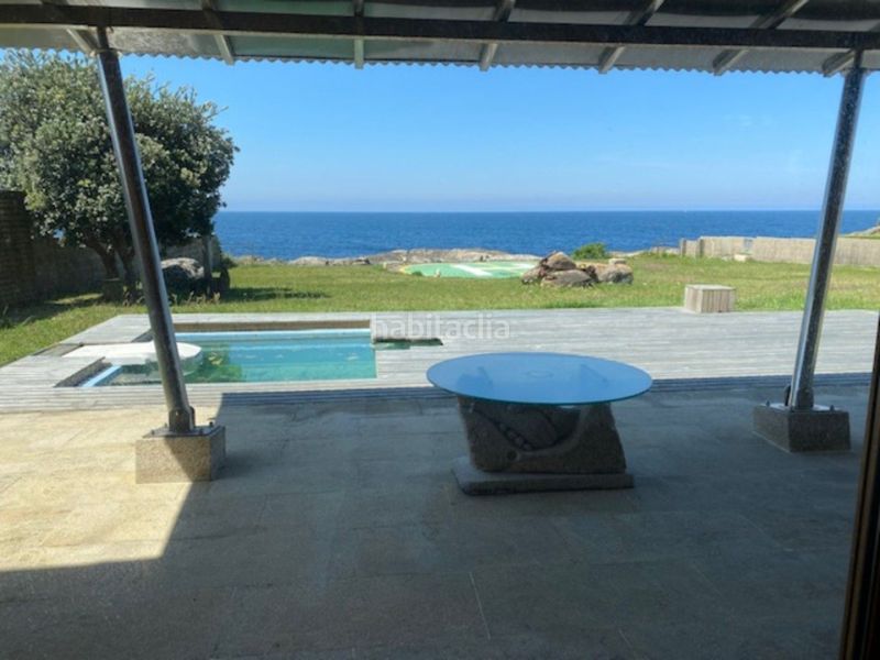 Foto ec11ffca-1007-4562-8852-89064966ac42. Alquiler casa alquiler vacacional disponible del 15 julio al 15 de agosto. preciosa vivienda unifamiliar en finca de 1000 m2 con arboles, piscin en Oia