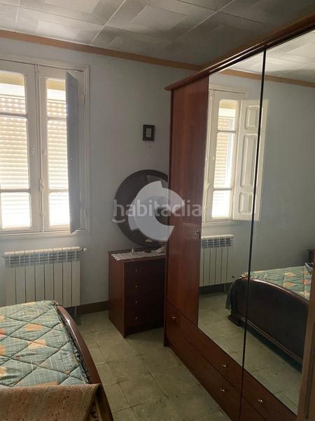 Foto c6d55fc1-8bc0-4151-8199-50fd83a42270. Casa adossada a San Cibrao das Viñas