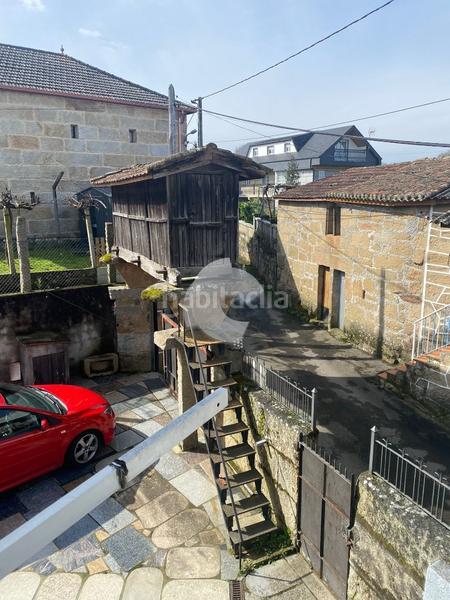 Foto db809d39-d798-49f8-bd65-40497761e73c. Casa adossada a San Cibrao das Viñas