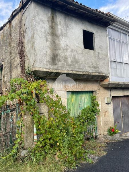 Foto f45b49a8-7c23-4211-8587-ab2df3d18d9c. Casa adossada a Esgos