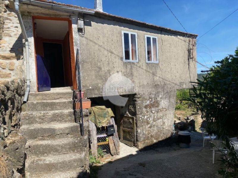 Foto e6685bc8-ec5f-4a63-bab0-0dc320a616ed. Casa adossada a Lobios