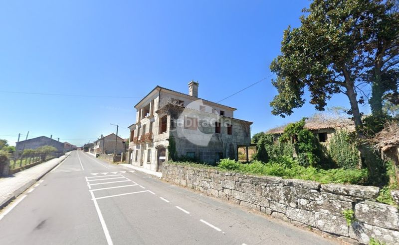 Foto 219b0509-2617-47b7-a209-70acd6b59ee2. Casa a Amoeiro