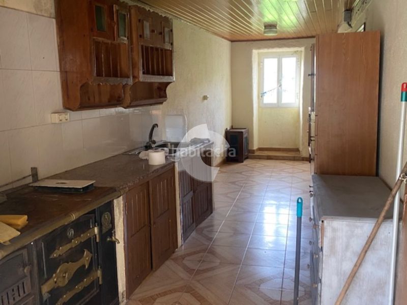 Foto 3e2faaee-d6e2-4201-a967-ec90585b3eb5. Casa adossada a Lobios