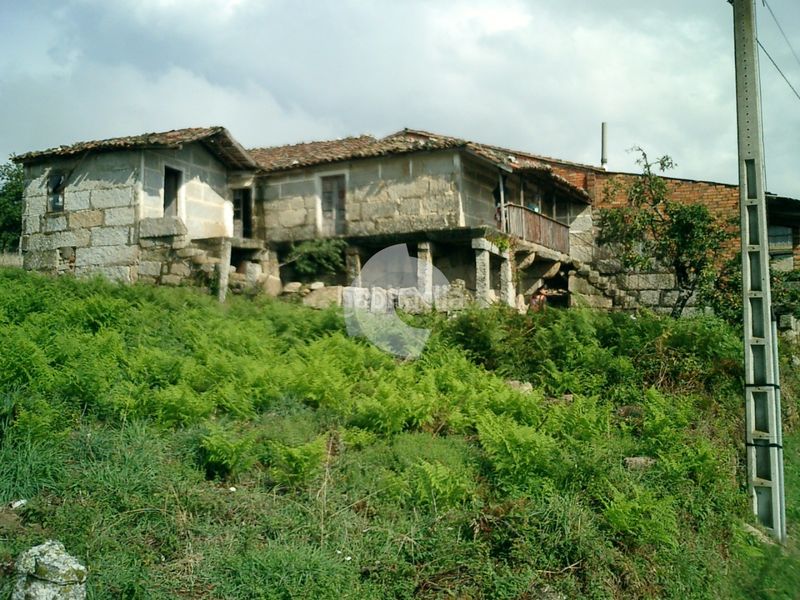 Foto 049d1e59-2633-4aac-8563-e1976407fbb6. Casa aparellada a Taboadela