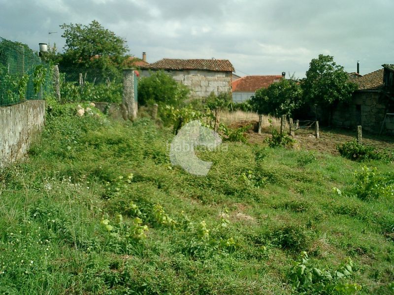Foto ba7f0adc-d82b-4571-8371-7a120ca799a7. Casa aparellada a Taboadela