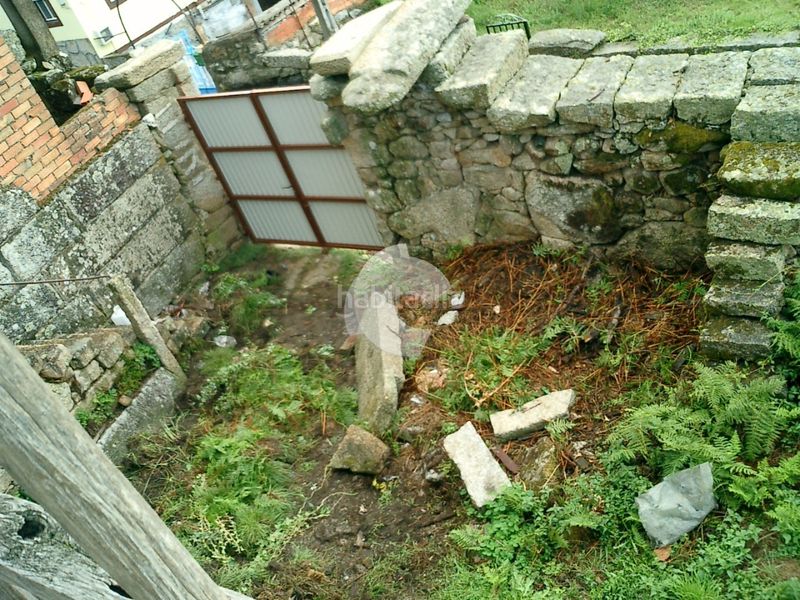 Foto dd73c25d-a694-4766-8334-ee96f643bfac. Casa aparellada a Taboadela