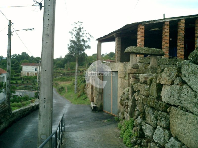 Foto e3d9ebc8-c4bd-4968-930b-26ebb37d7f4a. Casa aparellada a Taboadela