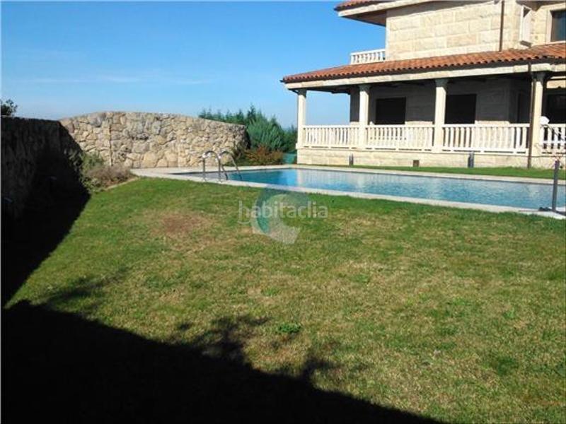 Foto 842c33e7-1df2-4fca-a971-a50dcc6832e0. Casa in San Cibrao das Viñas