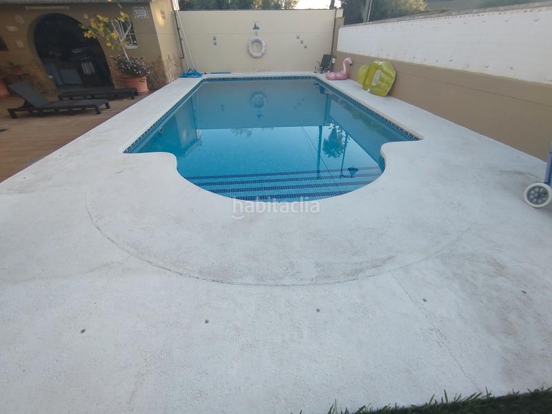 Foto 146ab1d2-9b1a-4e35-b5ec-2b311a150085. Chalet with fireplace parking pool in El Grao Castellón de la Plana