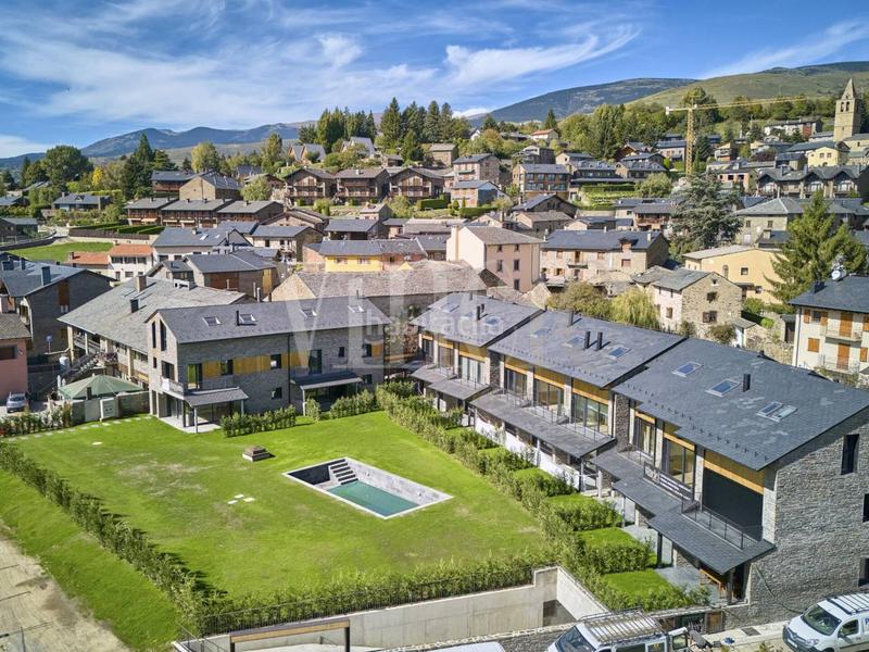 Foto 3f89d319-bda5-4ead-8f65-b0fcac9ef03f. Reihenhaus mit parking pool in Bolvir