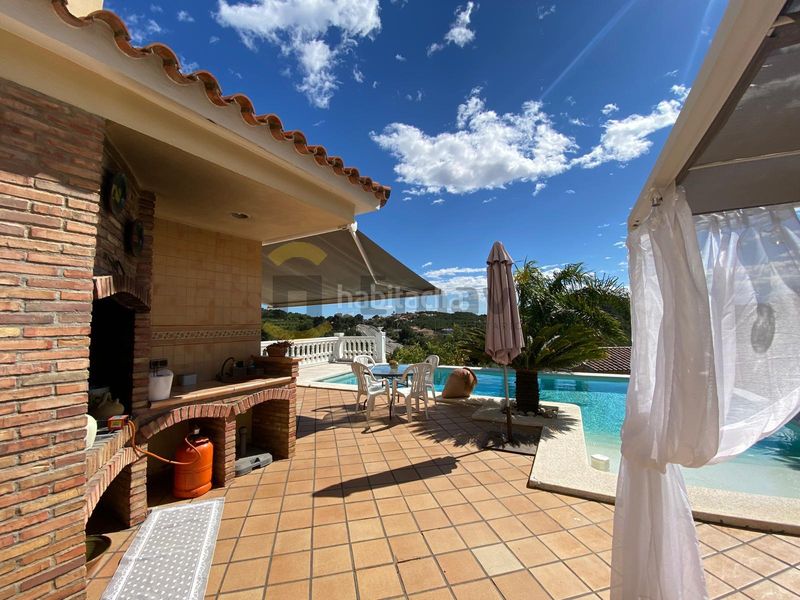 Foto 50e41eef-7b78-46c4-82e2-fac1d1f8ec13. Xalet amb xemeneia calefacció aparcament piscina a Borriol