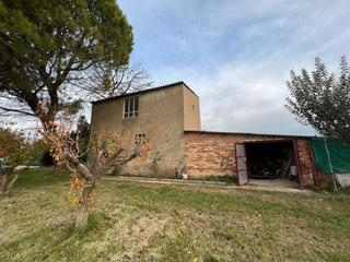 Finca rústica a Pastriz. Finca de 5,000 m2 con torre-almacen