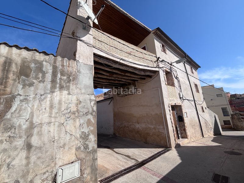 Foto 110e99d0-1619-4c1b-9a2b-f69f987b7193. Casa amb xemeneia aparcament a Escatrón