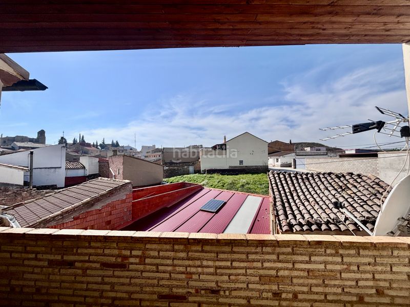 Foto adf43370-ded7-47bb-ab5a-e5591f43b264. Casa amb xemeneia aparcament a Escatrón