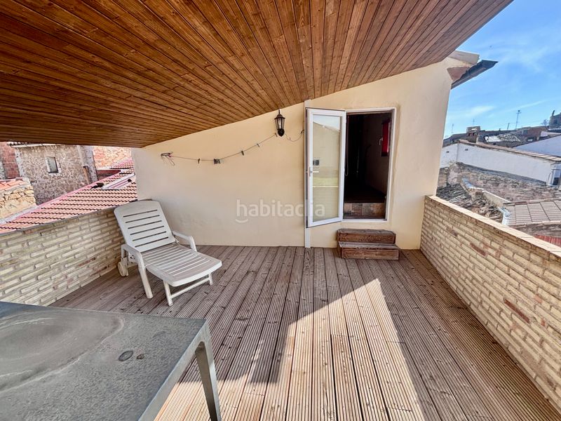 Foto f0c7a261-7ddb-40b2-ac67-a325860c1840. Casa amb xemeneia aparcament a Escatrón