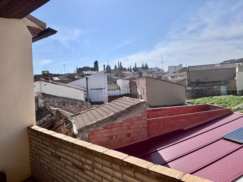 Foto f2b7ef63-eddc-468f-8f83-dacccf39b439. Casa amb xemeneia aparcament a Escatrón