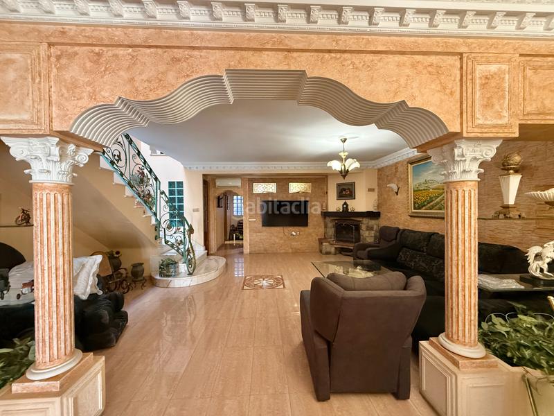 Foto e3518357-97b4-45b3-a529-30a512291a6f. Chalet con camino parcheggio piscina in Oliva pueblo Oliva