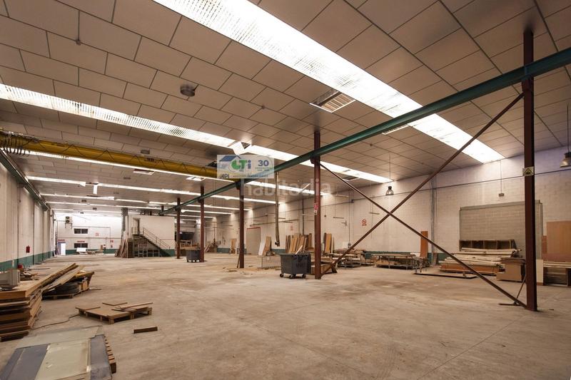 Foto 148a0a37-3aa1-4ec8-b98a-d30c7287d924. Fabrikhalle in Puebla de Alfindén (La)