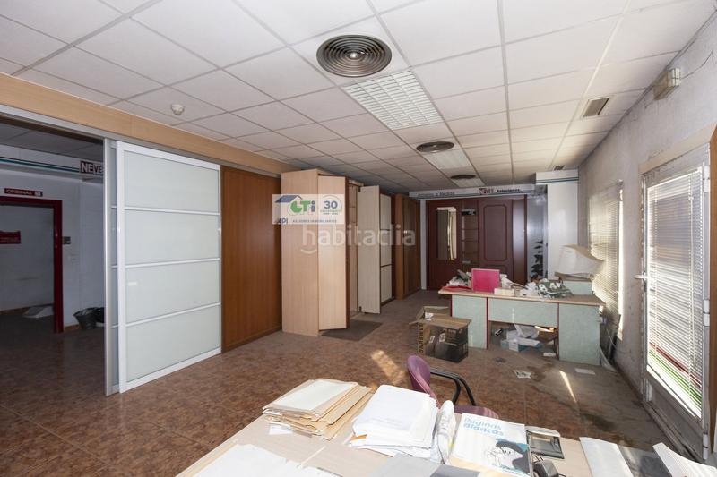 Foto 6ec4738b-dbcb-4ef3-b6ca-e485a53d2b7f. Fabrikhalle in Puebla de Alfindén (La)