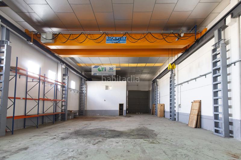 Foto 38cedb60-dcff-4a49-a689-2b57355b7725. Fabrikhalle in Puebla de Alfindén (La)