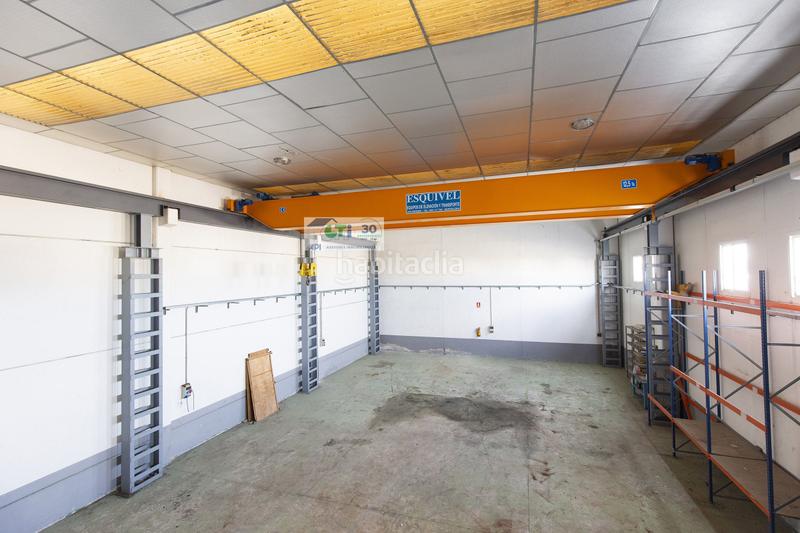 Foto 6274c1ca-ff50-4ff8-a122-ee176291aadf. Fabrikhalle in Puebla de Alfindén (La)