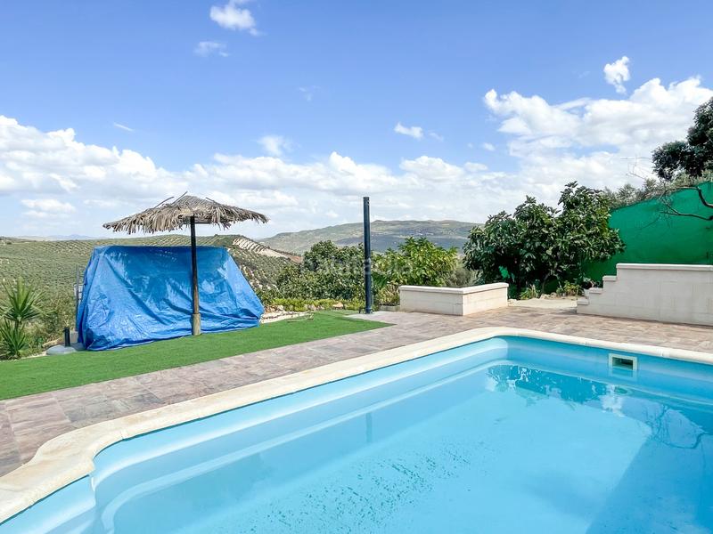 Foto 439e1b7d-bcce-42ab-90fc-c8531a5d979b. Casa bifamiliare con parcheggio piscina in Iznájar