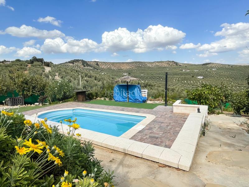 Foto c384295c-25a7-46b3-b8af-71d46eb7c38e. Casa bifamiliare con parcheggio piscina in Iznájar