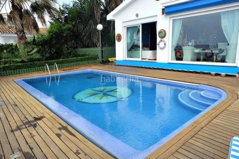 Foto 6c8450ec-a3b2-44d2-bcc5-14a9708e8232. Casa exquisite villa frente a la playa en el chaparral, costa en Mijas