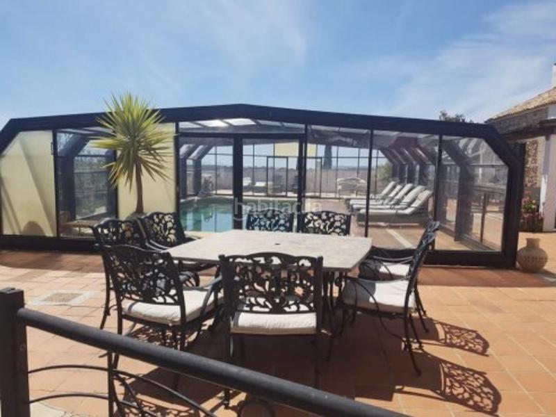 Foto f4a493e3-18e5-44e2-9fdf-1c1cc20727f4. Masia amb aparcament piscina a Mollina