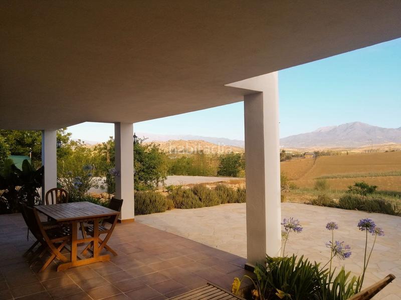 Foto 5cc5d5cb-2857-4b2d-b33f-ea51d5175709. Haus mit parking in Coín