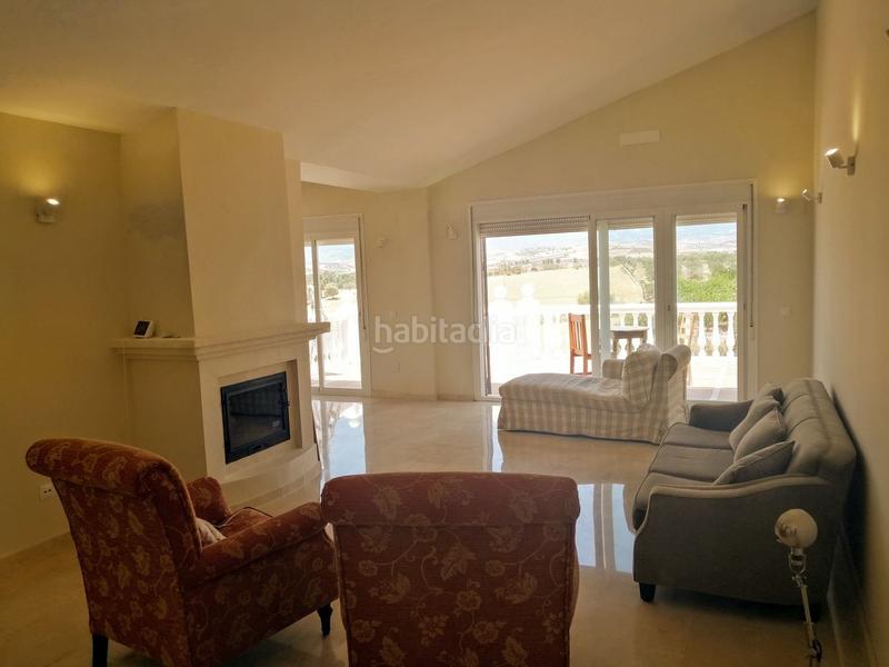 Foto 756ae5ae-61b2-4701-bcb4-4ab2118cb192. Haus mit parking in Coín