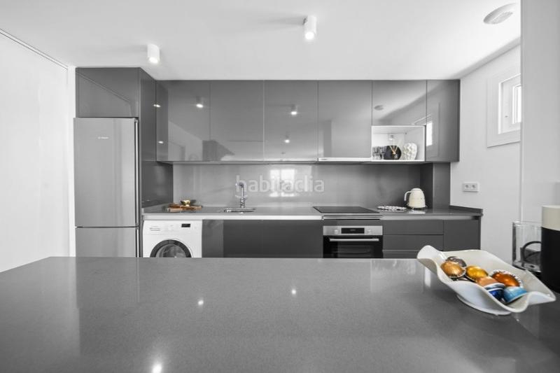 Foto 1f861631-36d5-4f2d-b32b-72cda56e037f. Casa aparellada amb calefacció aparcament piscina a Mijas