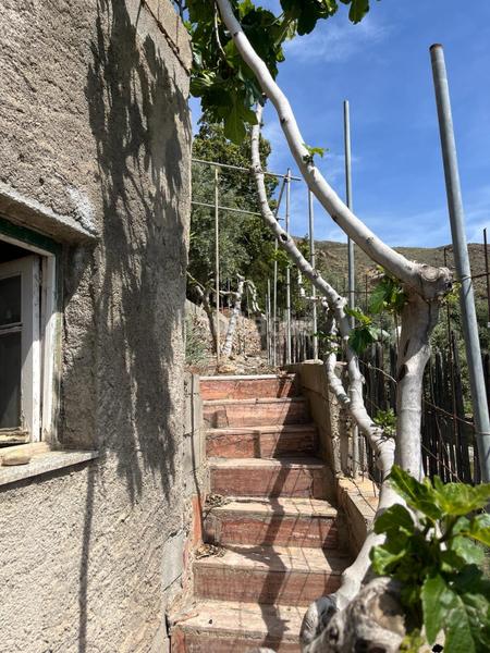 Foto c260c556-a1cb-47f1-9708-3081a9c1bb09. Terreno residencial vicar parcela de 2.073 m2 casa de 122 m2 en Vícar