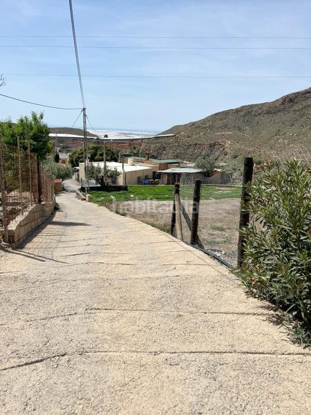 Foto d167c356-10ee-436f-862e-e38e3089d14d. Terreno residencial vicar parcela de 2.073 m2 casa de 122 m2 en Vícar