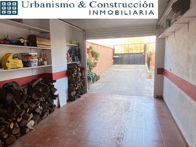 Foto 472103b0-36b0-4d1d-8811-946184317657. Casa a schiera con camino riscaldamento parcheggio in Ciudad Real
