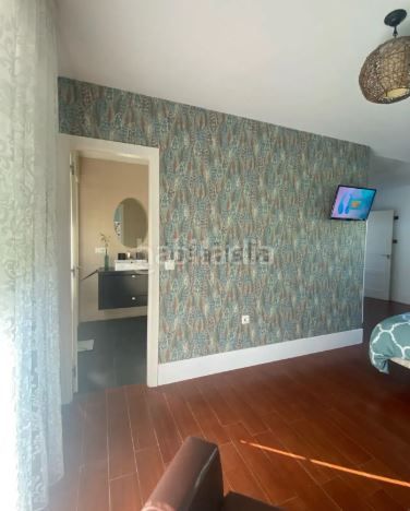 Foto 0340d84a-2606-42e7-a486-39619c5efc20. Casa en O Milladoiro Ames