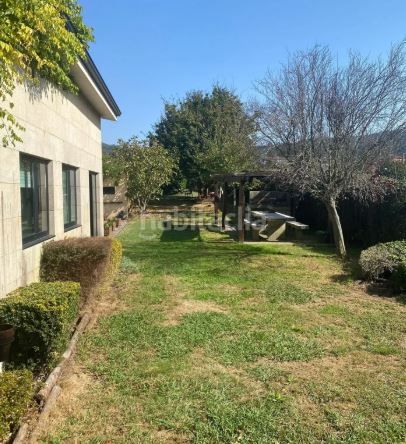 Foto 684541ad-f321-4b37-a848-8080409e4404. Casa en O Milladoiro Ames
